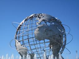 white globe with sky landscape