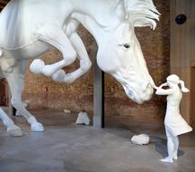 Girl and giant white Horse, art installation
