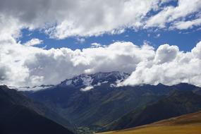 sky with clouds and mountains