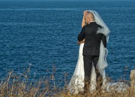 happy couple by the sea