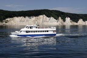 a boat floating on a cliff