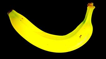 a tasty banana in a black screen