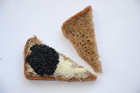 Crispy bread with black caviar