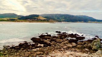 background picture of a beach with stones in california