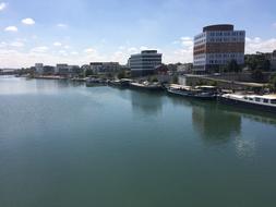 long river with buildings landscape