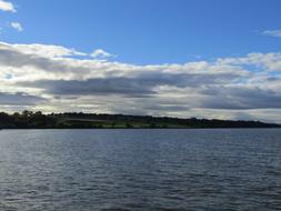 The lake with the clouds is beautiful