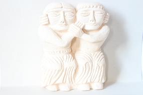 cute couple stone sculpture