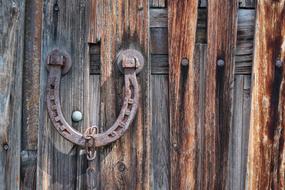 rusty horseshoe on the fence