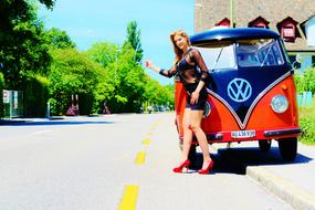 sexy girl in front of vintage vw bus