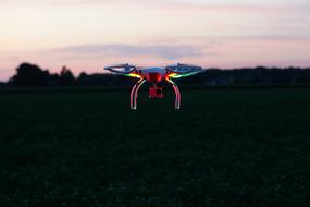 bright drone over the grass