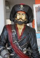 sculpture of man pirat at harbour