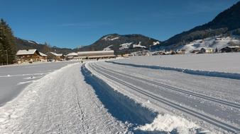 a beautiful snowy landscape in a blue sky