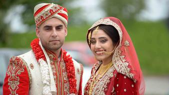 a beautiful couple in traditional costume