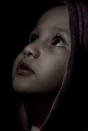 low key face Portrait of Child looking up