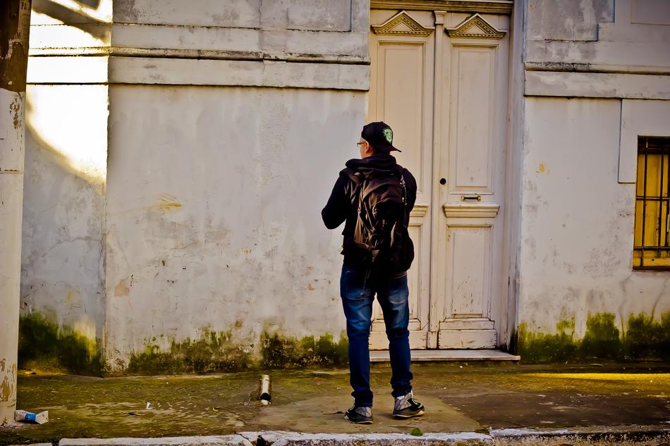 Person and old house