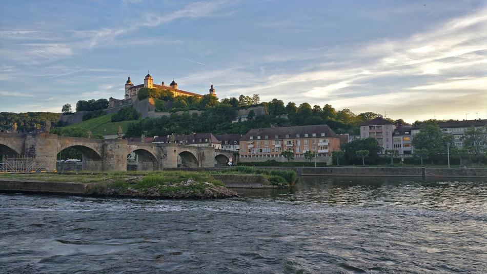 A big beautiful bridge with a castle