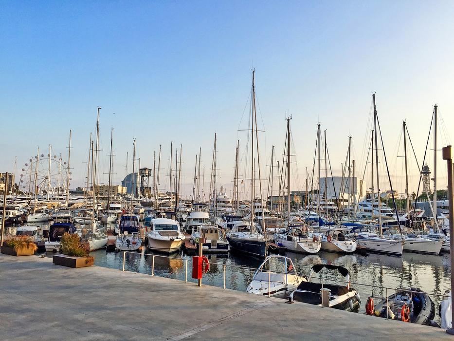 ships on the pier and yachts
