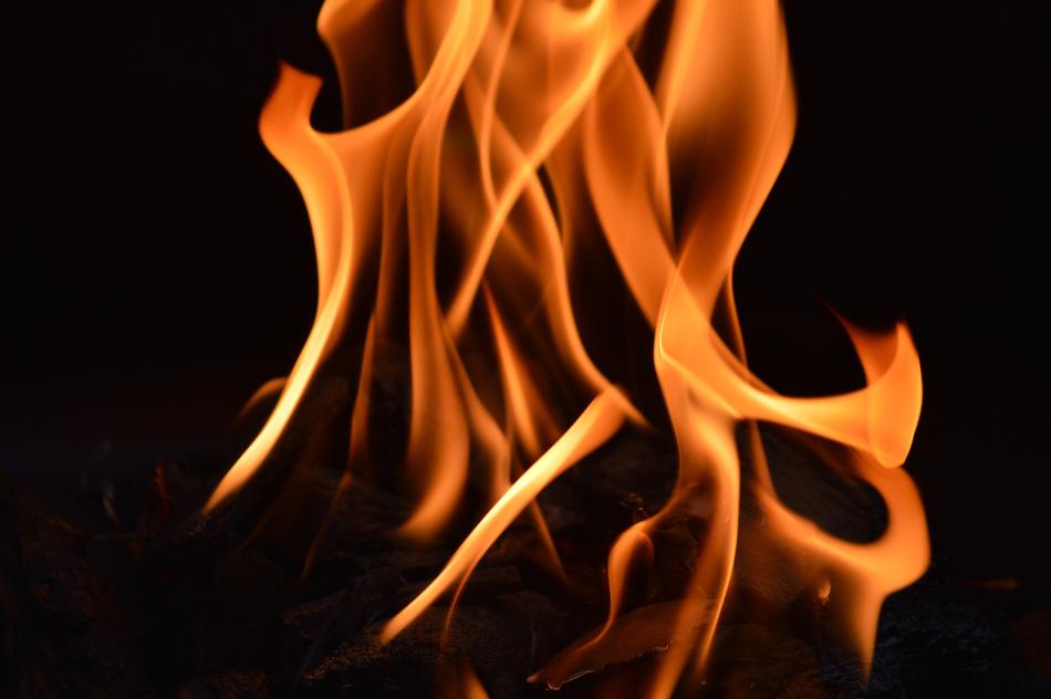 bright flame on black background