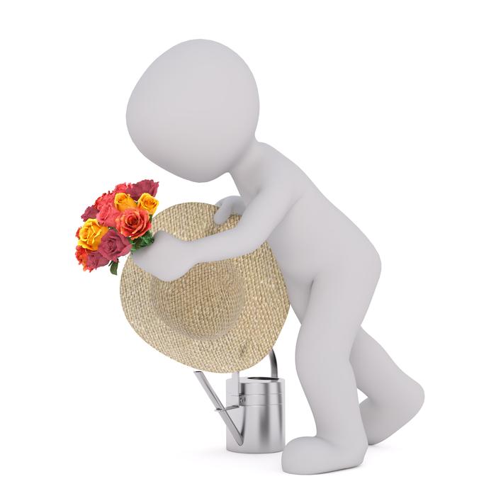 a man with a hat and flowers