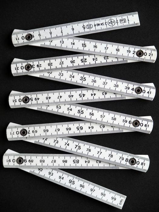 Tape Measure Members To Scale on black background