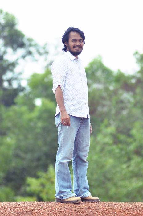 a man standing there smiling