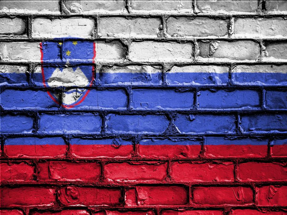the flag on the stone wall is beautiful.
