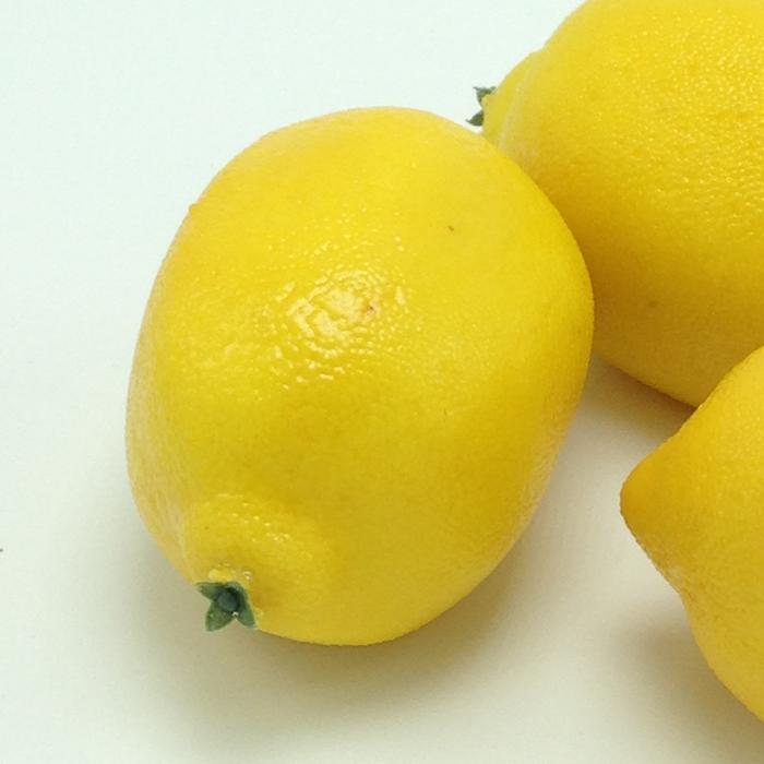Sour lemons on a white background