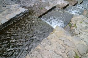 stone step with water