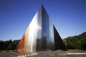 metal monument in a park in budapest