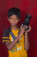 Photographer, Indian child Boy holds camera