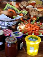 Vegetable dishes next to cans