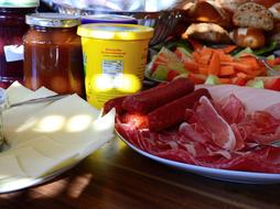 cheese and sausage on the table