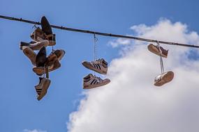 shoes hanging wire laces