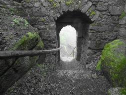 stone wall with an arch