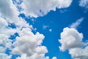 white fluffy Clouds at Blue sky