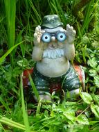garden gnome with binoculars