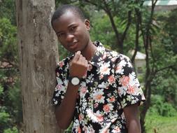 Portrait of handsome young african Man in bright shirt