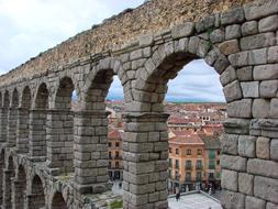 Arches of ancient roman Viaduct above old city, spain, Segovia