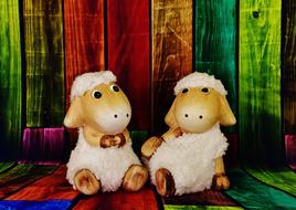 two Sheep sitting together, Funny figurines