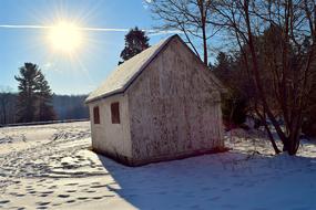 Snow House and Sun