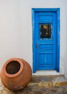 Door Wooden Blue and clay pot