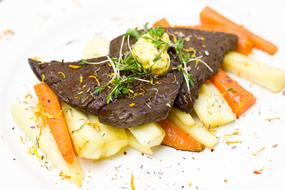 Boiled vegetables with roast meat