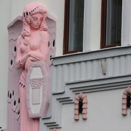 pink sculpture girl building