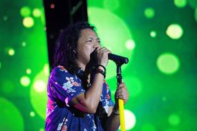 senior woman singing, Reggae Music Concert