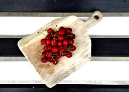 Cherry on a wooden board