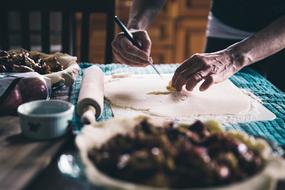 male Hands with knife and food, cooking