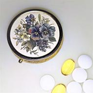 pills and pocket mirror