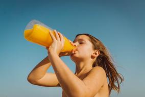 Girl orange juice