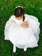Girl white dress green grass