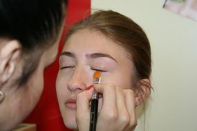 two girls doing Makeup